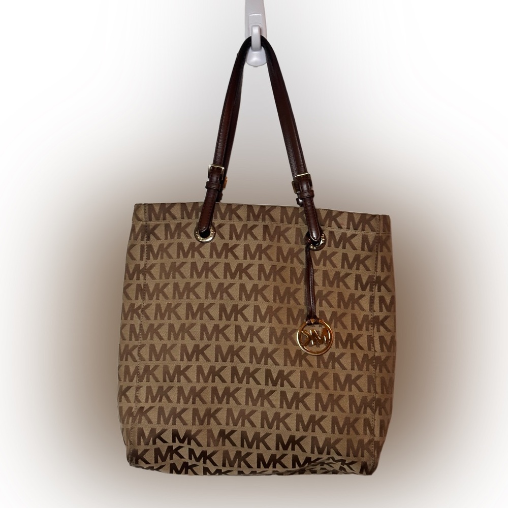 Michael Kors Tan and Brown Logo Tote Needs a cleaning otherwise good condition